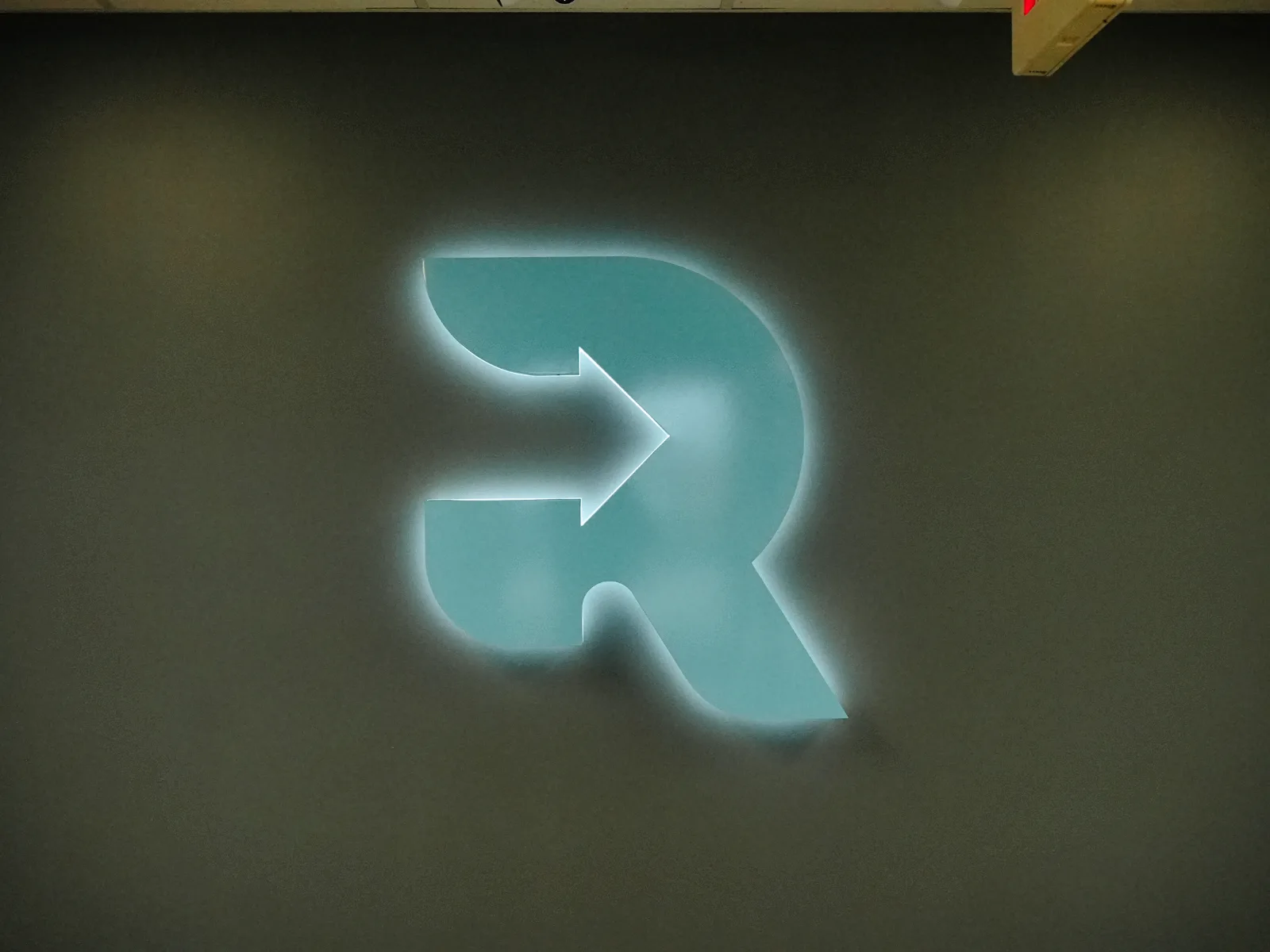 Backlit Refreshed Tech logo sign at the Ashley, Indiana facility where school Chromebooks are wiped and inspected